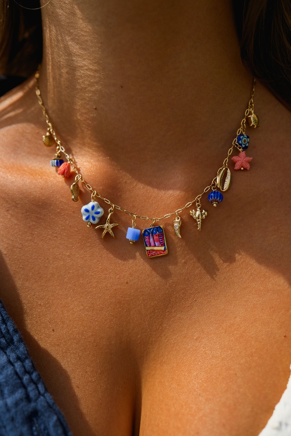 Collier Juma - doré et bleu