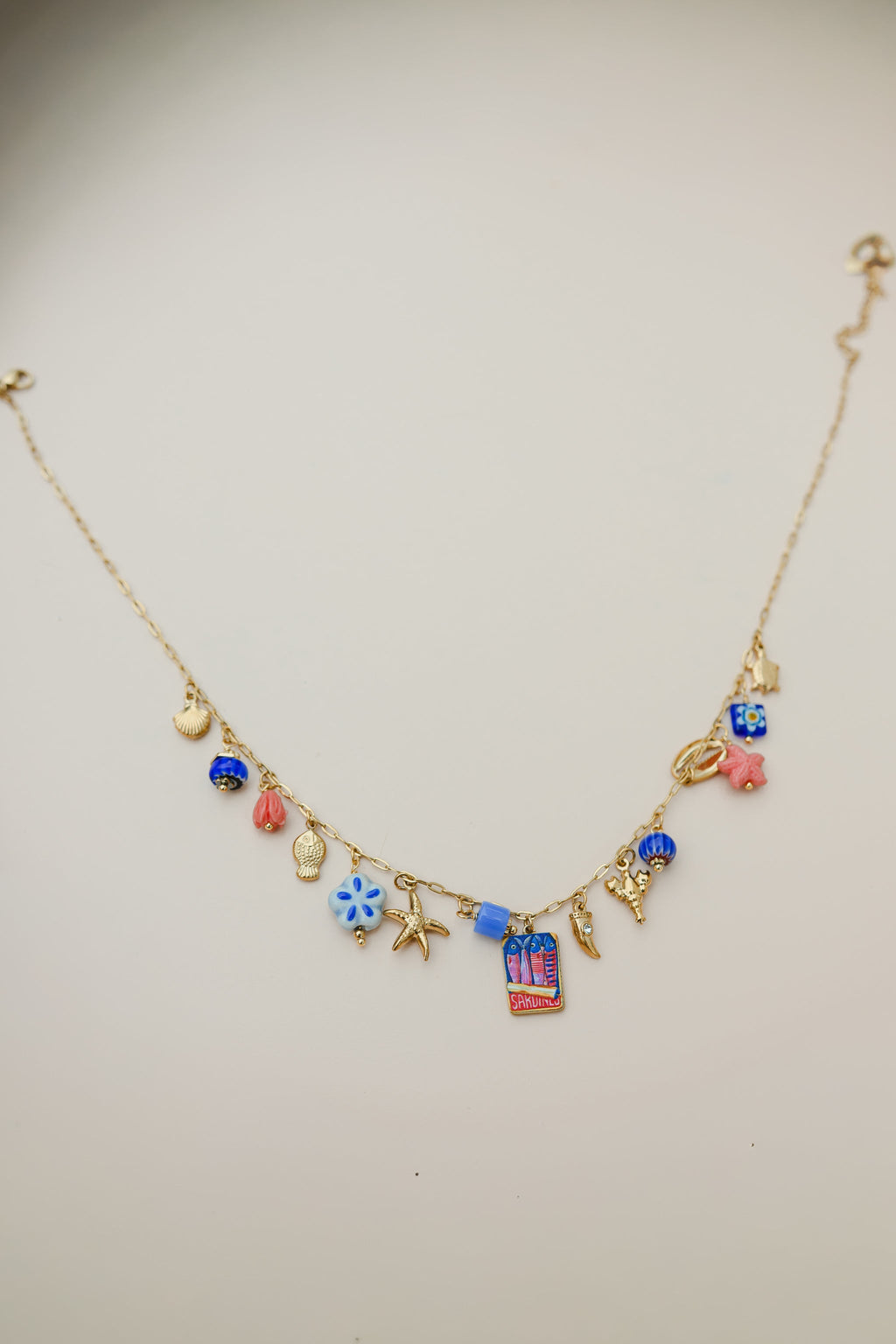 Collier Juma - doré et bleu
