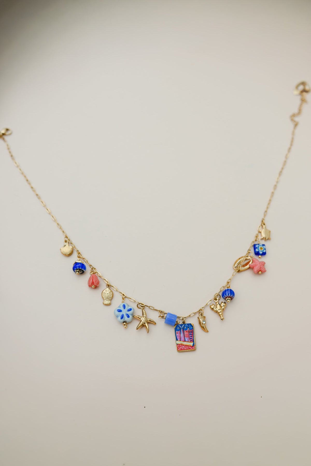 Collier Juma - doré et bleu