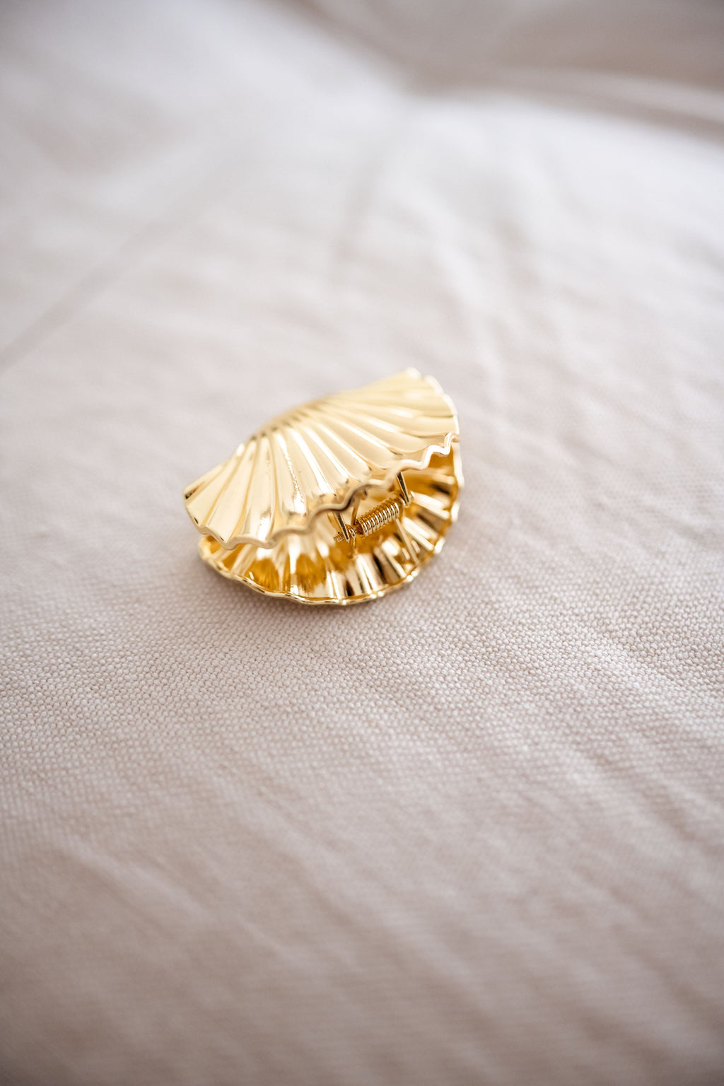Pince coquillage - dorée
