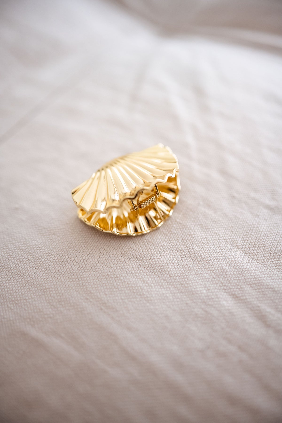 Pince coquillage - dorée