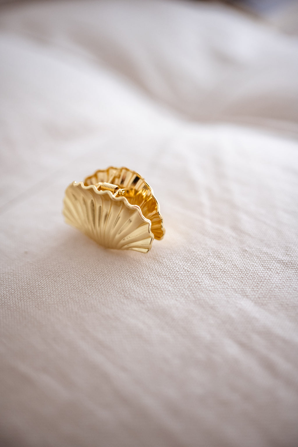 Pince coquillage - dorée