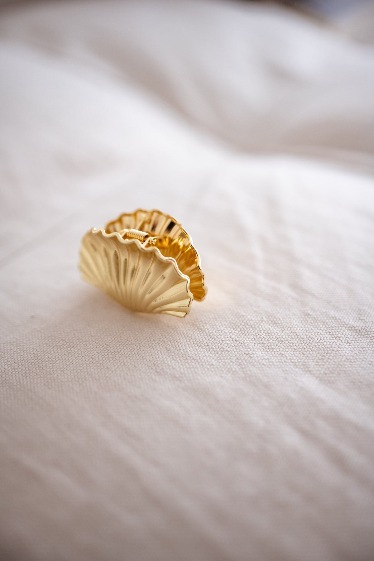 Pince coquillage - dorée