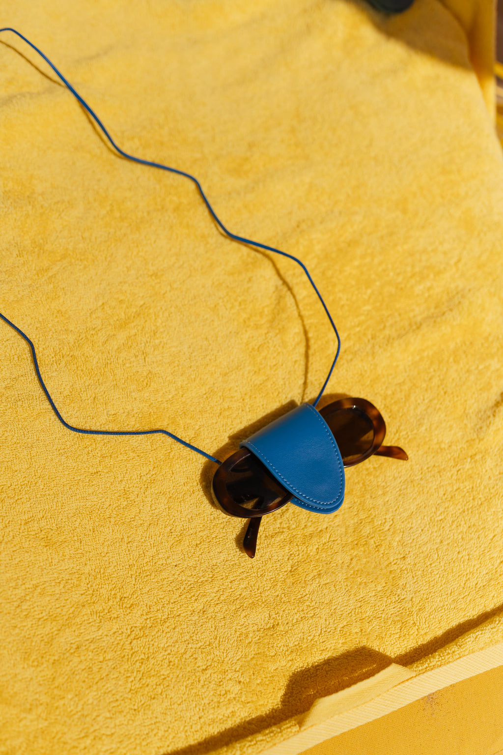 Porte lunette Pavo - bleu